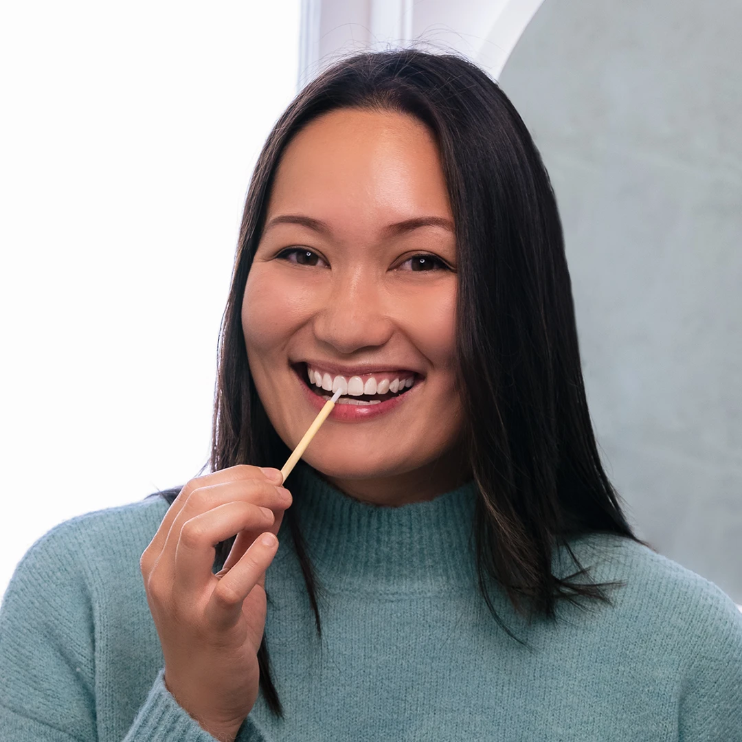 Person smiling with white teeth